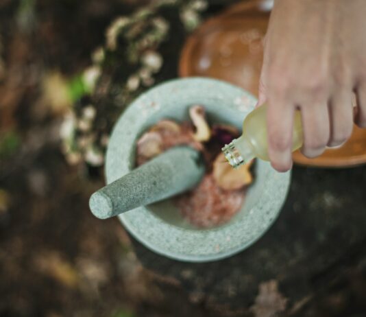 “일상 속 대체요법, 건강한 변화 이끄는 새로운 생활 습관” high angle photo of person pouring liquid from bottle inside mortar and pestle