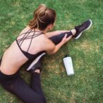 일상 속 근육 건강, 실천 가능한 루틴으로 지키자 woman in black lingerie holding white bottle